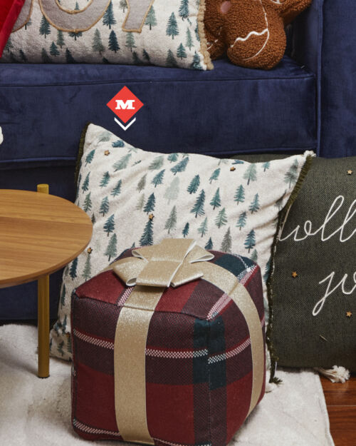 Cojín verde con árboles