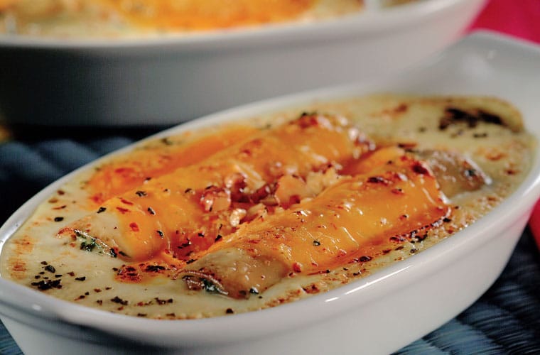 Canelones rellenos de arroz a la parmesana